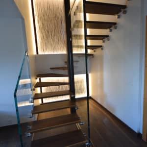 Wood and glass staircase, in a villa